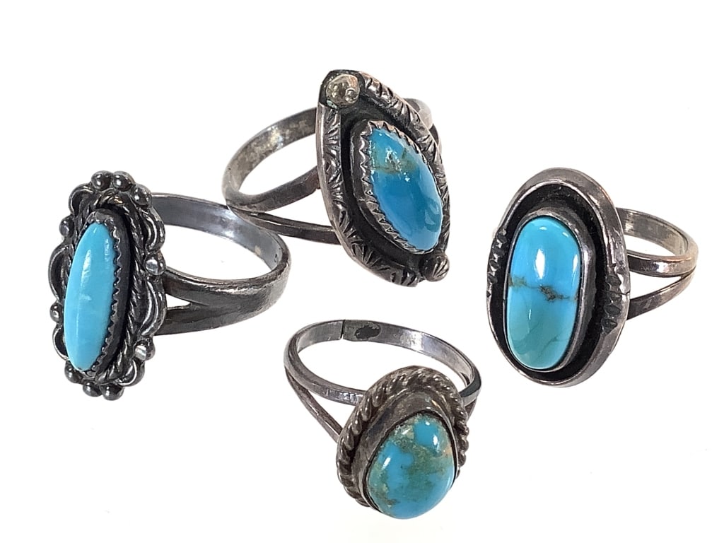 4 Sterling Turquoise Rings 14.2g TW: Sizes 3 1/2 - 8. Unmarked rings were acid tested for sterling.