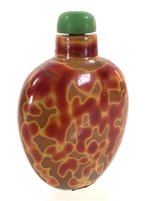 Chinese Realgar Glass Swirl Snuff 1730-1820: Styled after Realgar mineral bottles, this uses a glass swirl technique mastered during the Qing dynasty, bottle is dated from 1730-1820. Has original ivory spoon.