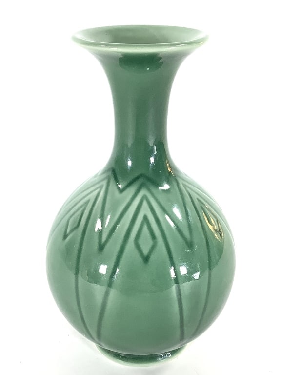 1951 Rookwood Celadon Glaze Vase #7075: 7 1/4"H. Well marked with Rookwood logo above LIII and the model number 7075. Very good condition.