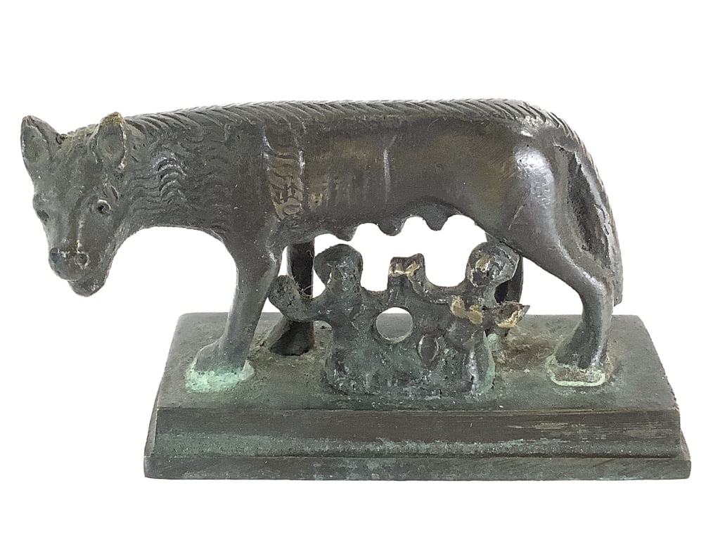 Romulus & Remus Miniature Bronze Statuette: 3 3/4"L x 2 1/4"H. Statuette depicting the mythological birth Rome's founder in the twins Romulus and Remus with their wolf foster mother. After a large bronze sculpture c. 500?480 bce; in the