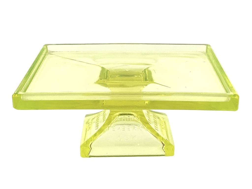 Clarks Teaberry Gum Uranium Glass Display: 7"L x 5"W x 3 1/4"H. Marked "Clarks Teaberry Gum" on base. No chipping. Overall very good condition.