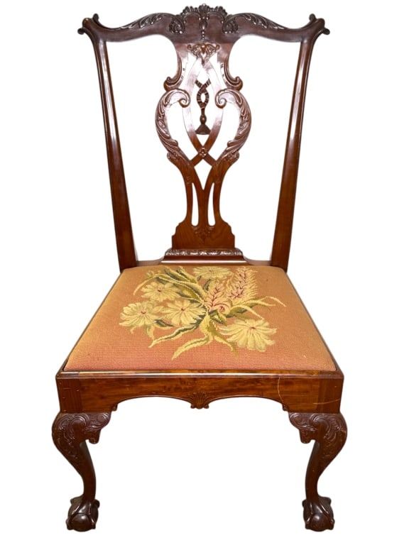 Nathan Margolis Chippendale Style Side Chair: 23" x 21"D x 40"H. Highly carved legs with claw and ball feet, shaped back rail and open work back splat. Crewel work seat cushion.