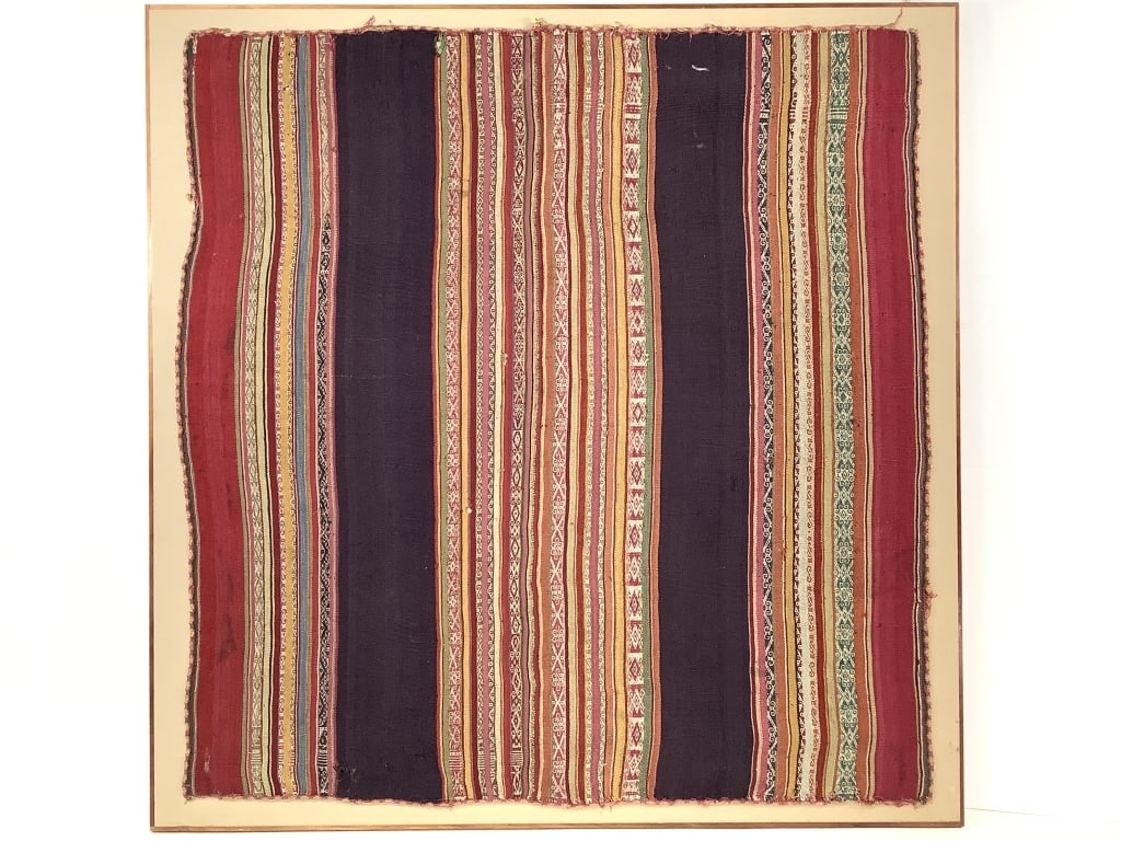 Framed Andean Aymara Ceremonial Manta: Frame 38" x 38", textile 36" x 34 1/2". Shows boarder fraying, specifically along top. Minor holes and loose threading dotted throughout. Overall intact, vibrant colors and intricate details. Provenan