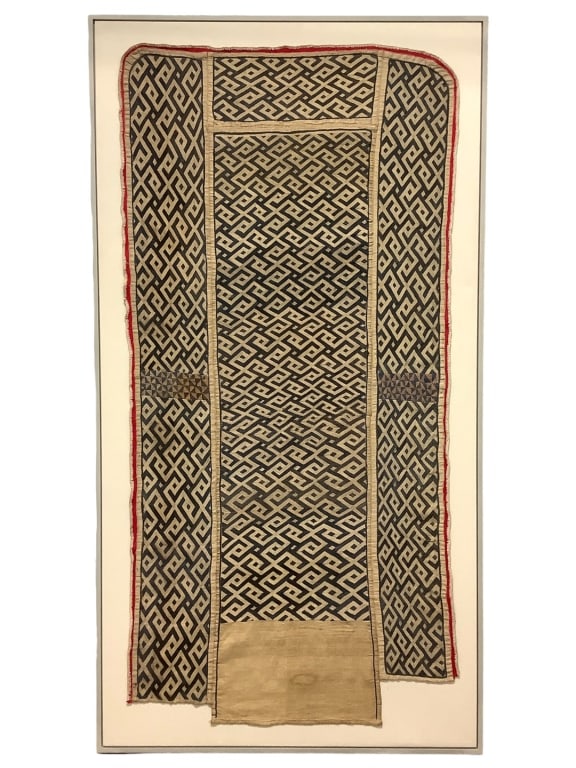 Kuba Raffia w Embroidery Wrap Skirt: 69 1/2"H x 37"W framed, 63 3/4" x 31 1/2" textile. Open frame sewn to canvas. Oval repaired area 2" across at bottom center. Provenance: Collection of William and Diane Itter. Please see photos for