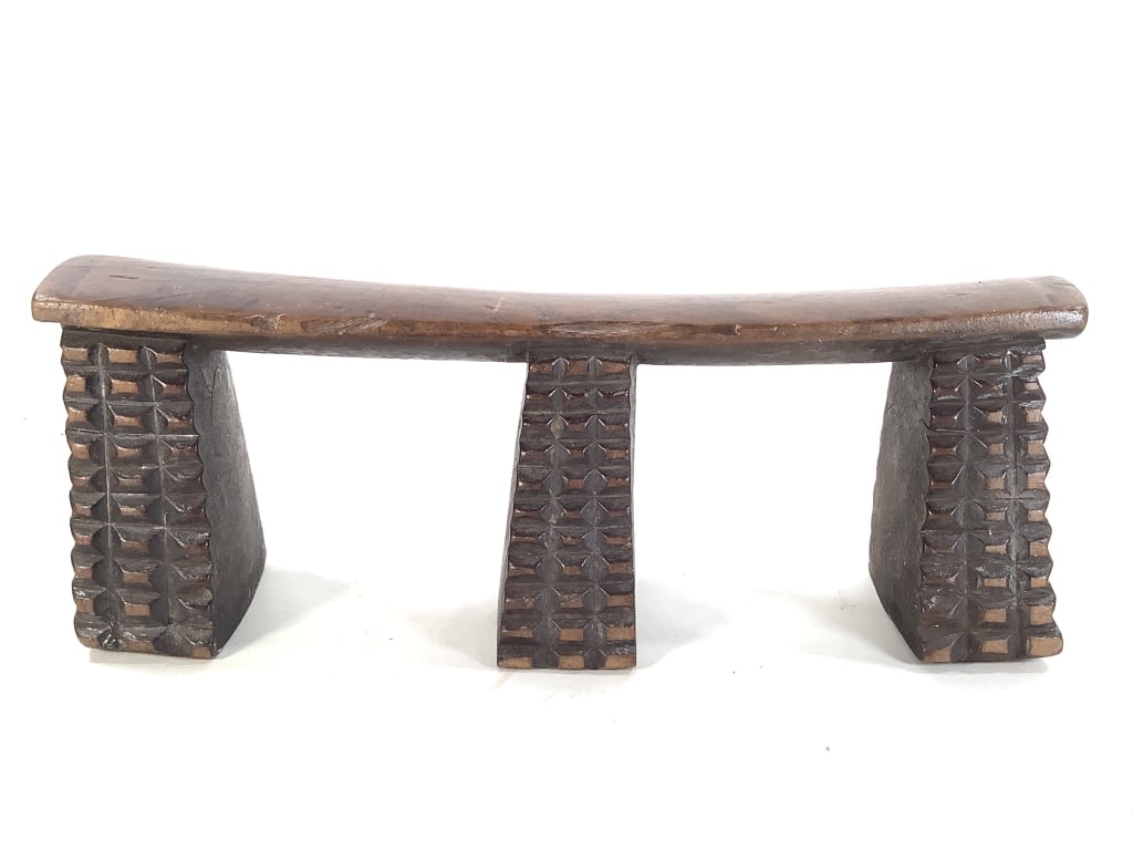 Zulu Carved Wood Head Rest South Africa: 15 1/2"W x 4"D x 5 3/8"H. Good condition for age, some surface wear and chips. Provenance: Collection of William and Diane Itter. Please see photos for condition and details.