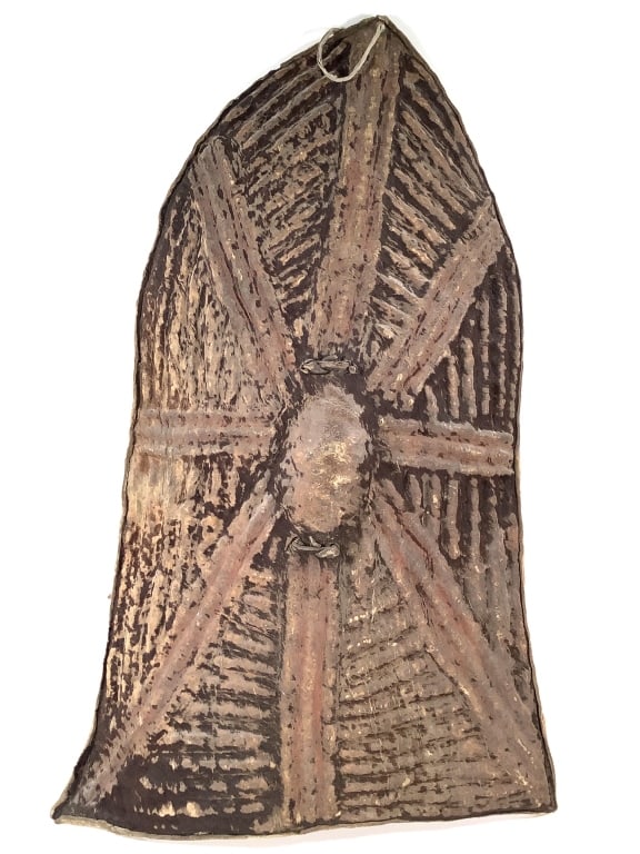 Kirdi Shield Cameroon: 37" x 24". Tanned animal hide over wooden frame with natural pigments. Provenance: Collection of William and Diane Itter. Please see photos for condition and details.