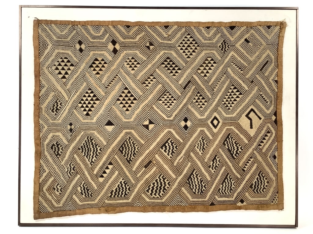 Kuba Cloth Cut Pile & Embroid Textile Panel Framed: 31" x 24 1/2" (framed) 27 3/4" x 21 1/8" (sight). Stitched to canvas backing. Provenance: Collection of William and Diane Itter. Please see photos for condition and details.