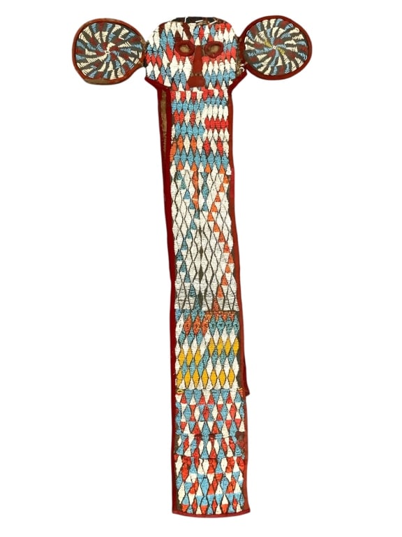Elephant Mask Beaded Bamileke Cameroon: Kuosi society elephant mask. 49 1/2" front length, 24 1/4" across head from ear to ear end. Made of raffia, cotton, and wool cloth, dyed pattern on some of the fabric with glass beadwork surface