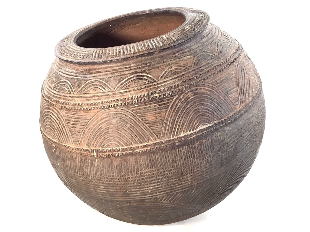 Nupe Nigerian Terracotta Water Pot: 15 1/2"Dia x 15"H. Provenance: Collection of William and Diane Itter. Please see photos for condition and details. Please note: Some pots may have repairs that may not be noted.