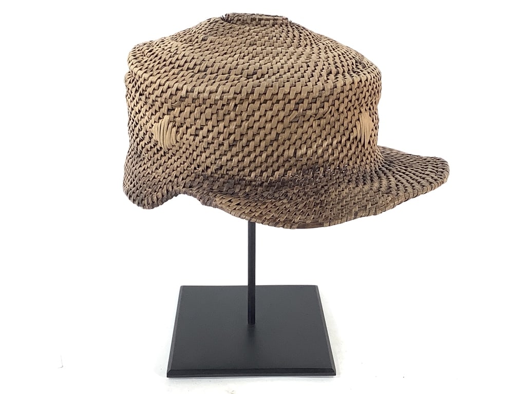 Kongo Woven Raffia Cap DRC: 10" from front to back, 7 1/4" at cap, 6 3/4" at ear, 4 1/2"H. Democratic Republic of Congo. Provenance: Collection of William and Diane Itter. Please see photos for condition and details.