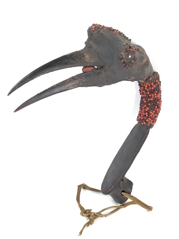 Hausa Hunters Bird Decoy Headdress West Africa: 14 1/2"H x 12" (front to back) x 3 1/2" (across at head). Skin over bird skull, Leather over wood base, fabric tie, and decorated with abra seed beads. Provenance: Collection of William and Diane Itte