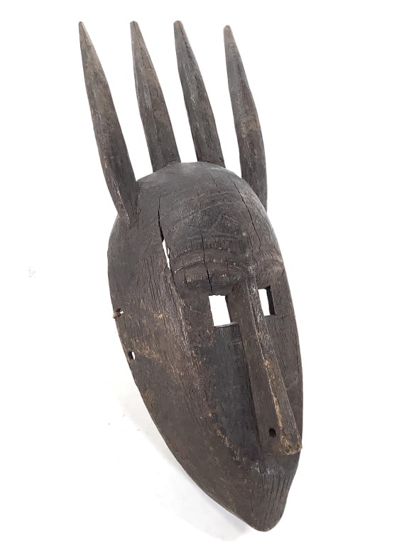 Mali Bamana Ntomo Mask: 17"H x 6"W. Carved wood mask. Fair condition, natural wear consistent with age, with some splitting to the wood. Provenance: Collection of William and Diane Itter. Please see photos for condition and 