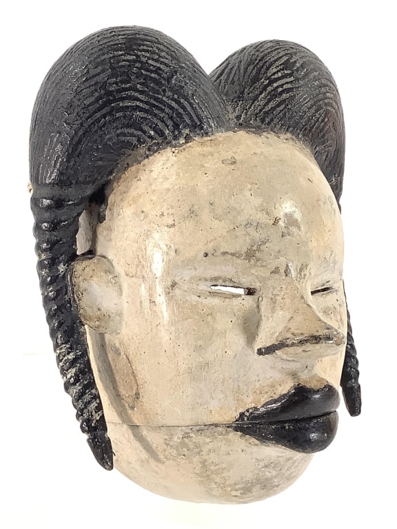 Ogoni Elu Moving-Jaw Mask Nigeria: 7"H x 6"W. Hand-carved wood with fiber cord hinge. Good condition, natural wear consistent with age. Provenance: Collection of William and Diane Itter. Please see photos for condition and details.