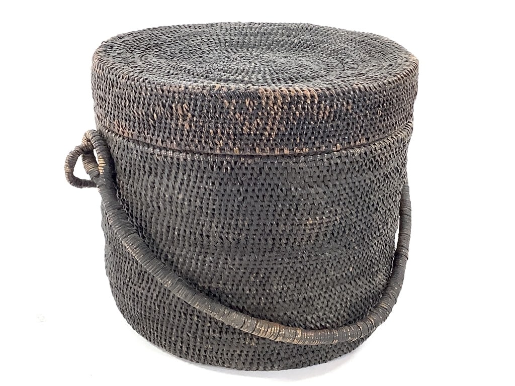 African Rattan Lidded Basket: 10"H x 11"Dia. Woven rattan with fitted lid. Good condition, natural wear consistent with age, no visible losses. Provenance: Collection of William and Diane Itter. Please see photos for condition and