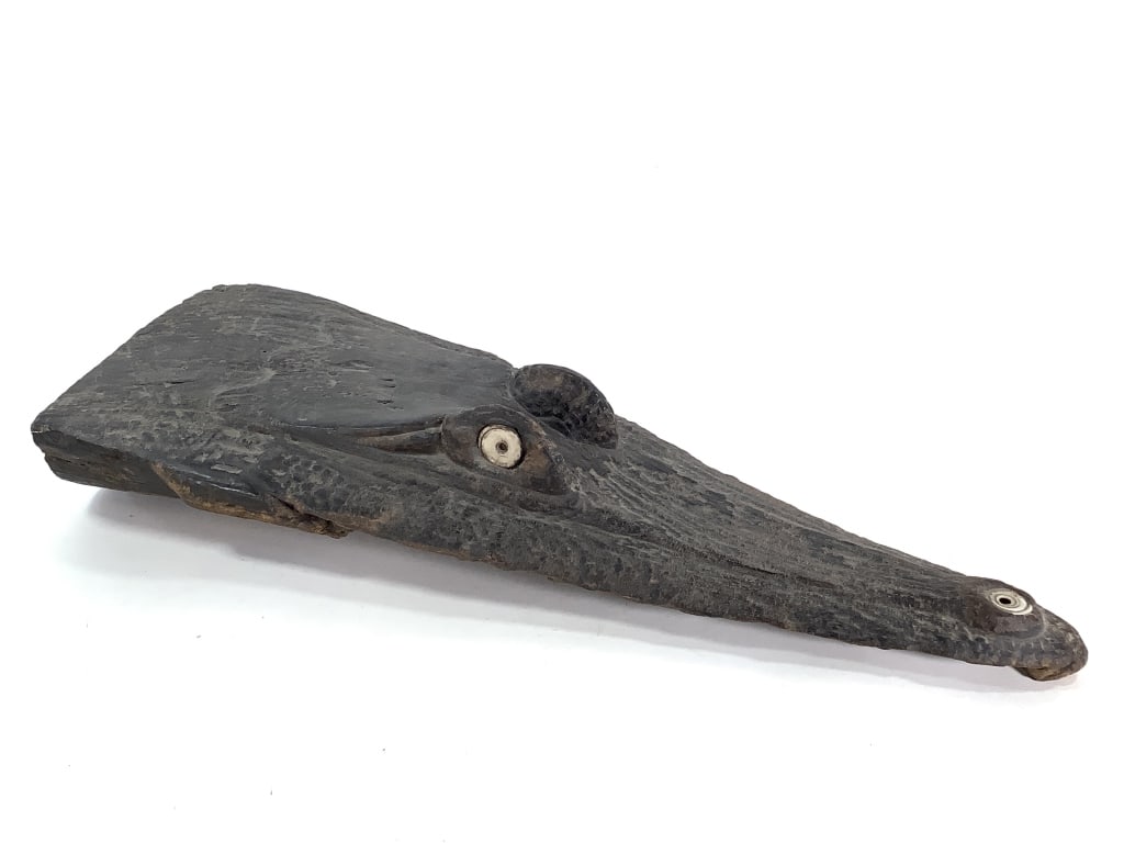 Hand Carved Canoe Prow New Guinea: 27"H x 10"W. Hand-carved wood. Good condition, natural wear consistent with age. Provenance: Collection of William and Diane Itter. Please see photos for condition and details.