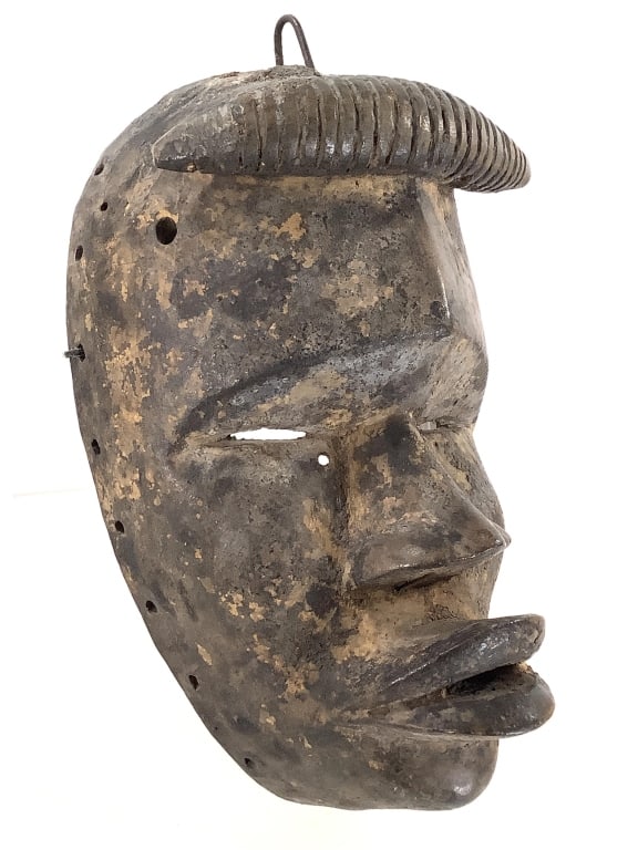 West African Mask: 9 3/8"H x 5 1/2"W x 3 1/2"D. Provenance: Collection of William and Diane Itter. Please see photos for condition and details.