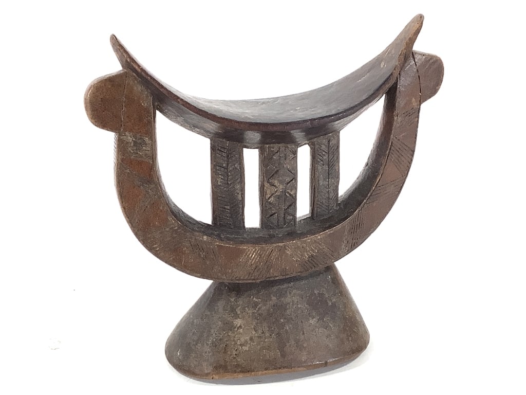 Ethiopian Wood Headrest: 8 3/4"H x 9"W x 3 1/2"D. Provenance: Collection of William and Diane Itter. Please see photos for condition and details.