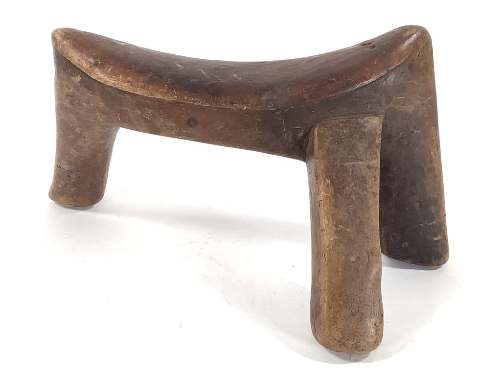 African Wooden Headrest: 6 1/2"H x 11 5/8"W x 5 1/2"D. Provenance: Collection of William and Diane Itter. Please see photos for condition and details.