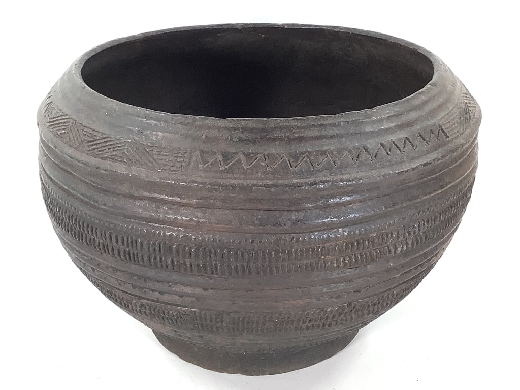 Nigerian Nupe Terracotta Water Vessel: 12 1/2"Dia. x 9"H. Provenance: Collection of William and Diane Itter. Please see photos for condition and details. Please note: Some pots may have repairs that may not be noted.