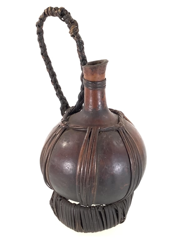 Cameroon Palm Wine Gourd: 14"H x 6 3/4"Dia. Provenance: Collection of William and Diane Itter. Please see photos for condition and details.