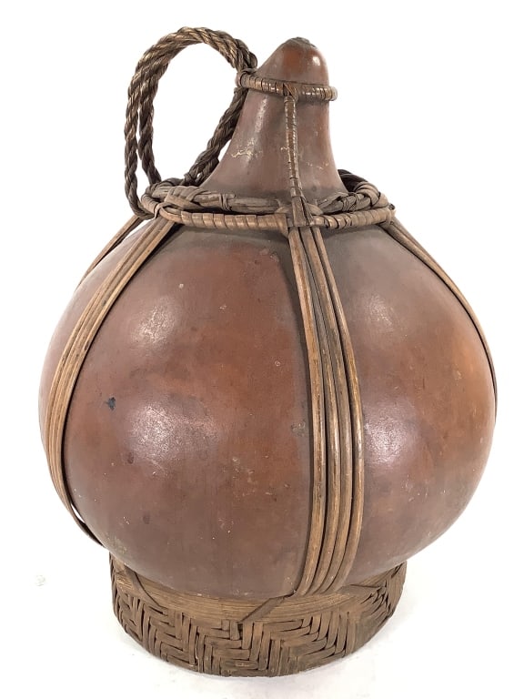 Cameroon Grassland Palm Wine Gourd: 16 1/2"H x 13"Dia. Provenance: Collection of William and Diane Itter. Please see photos for condition and details.