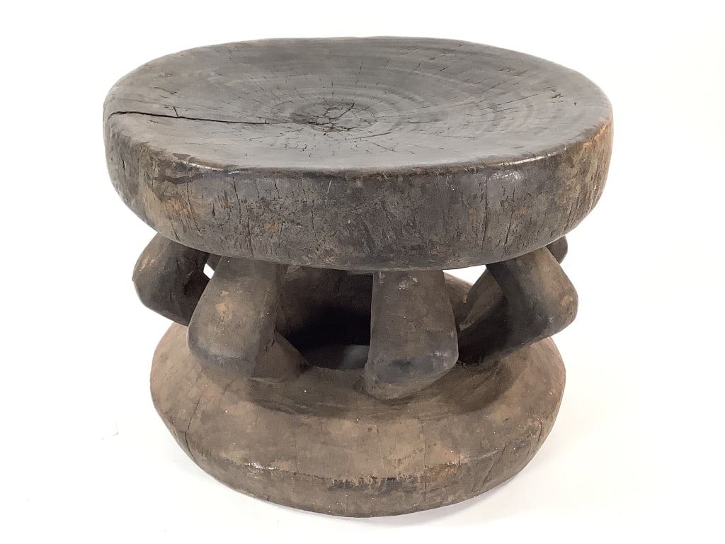 Cameroon Hand Carved Wooden Stool: 10"H, 12 1/2"Dia. Stool, has 4" crack from seat edge inward. Provenance: Collection of William and Diane Itter. Please see photos for condition and details.