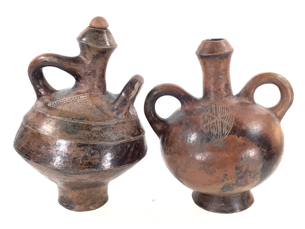 2 Teke or Tio Terracotta Vessels DRC: Larger, 11"H x 7 1/4"Dia. Provenance: Collection of William and Diane Itter. Please see photos for condition and details. Please note: Some pots may have repairs that may not be noted.