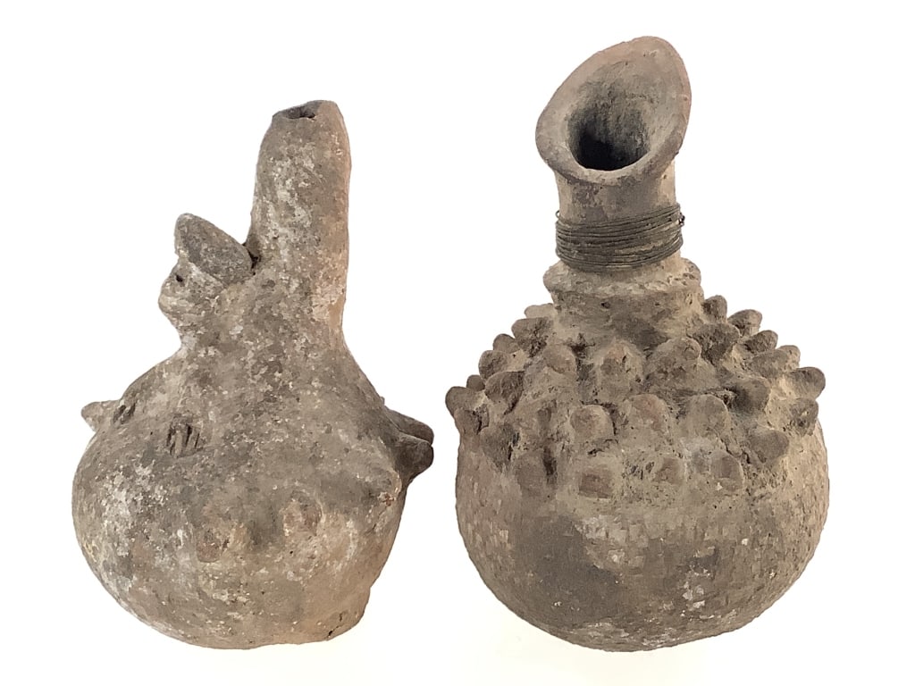 2 Nigerian Medicinal Pot: Largest, 16"H. Provenance: Collection of William and Diane Itter. Please see photos for condition and details. Please note: Some pots may have repairs that may not be noted.