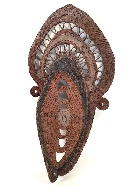 Abelam Papua New Guinea Yam Mask: 21"H x 13"W. Woven fiber with natural pigments. Provenance: Collection of William and Diane Itter. Please see photos for condition and details.