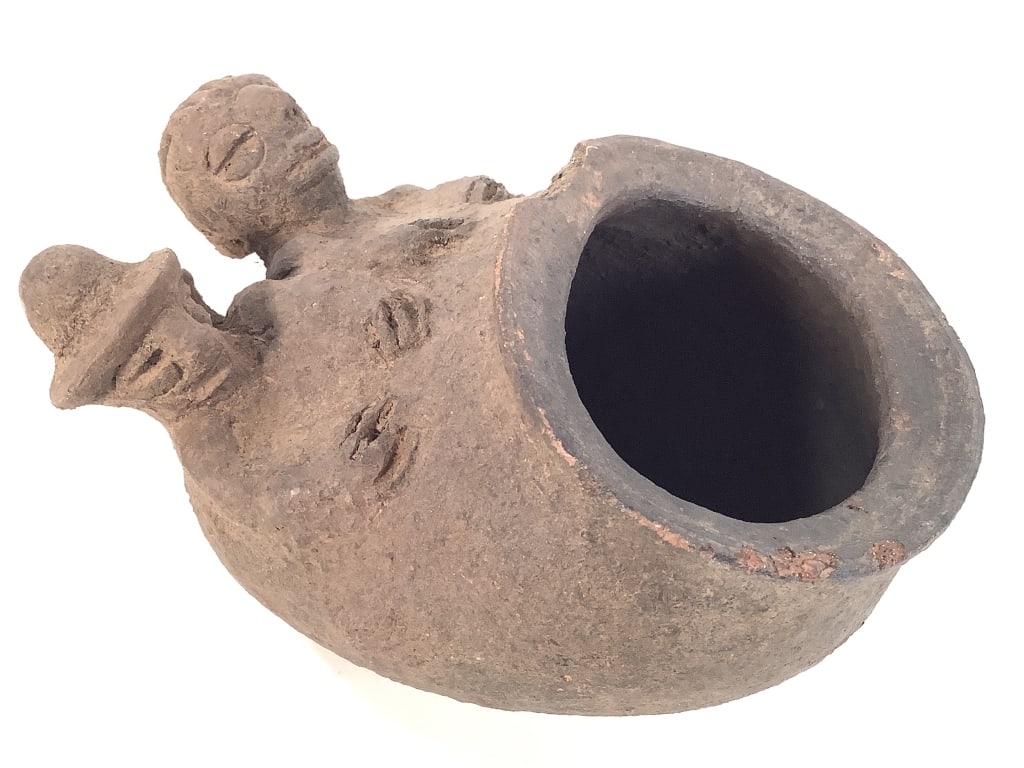 Igbo Izzi Ritual Jar Nigeria: 6 3/4"H x 4 1/2"Dia. Chip at top of bowl edge. Provenance: Collection of William and Diane Itter. Please see photos for condition and details. Please note: Some pots may have repairs that may not be