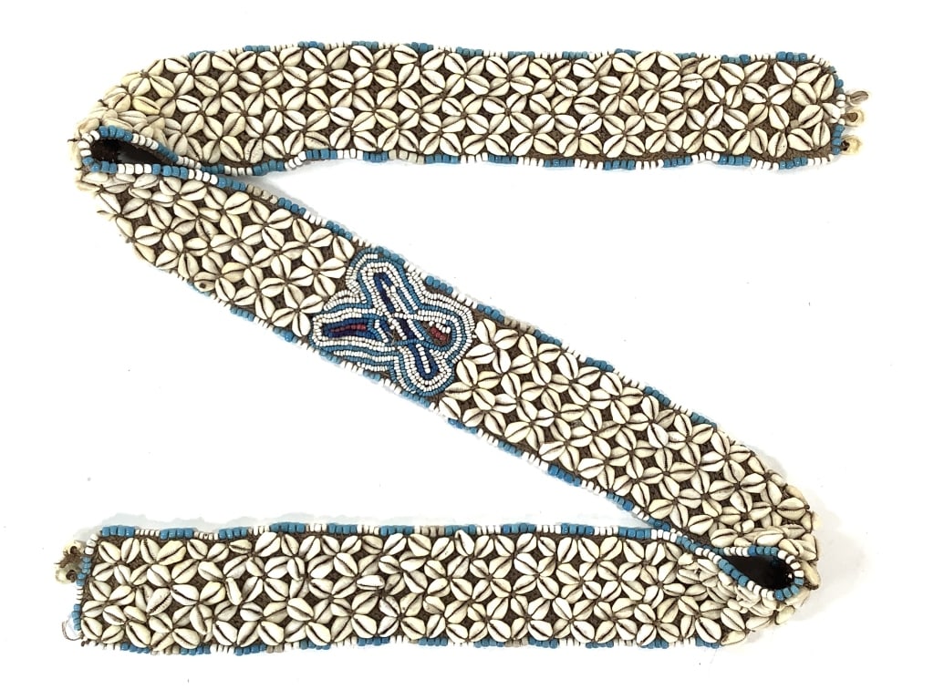 4 Kuba Beadwork Cowrie Shell Belt DRC: 3 1/8"W x 61 1/2"L. Provenance: Collection of William and Diane Itter. Please see photos for condition and details.