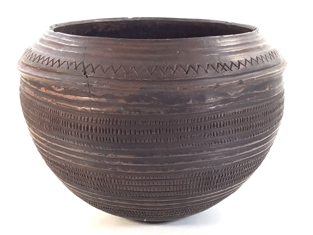 Nupe Storage Vessel Nigeria: 10 3/4"H x 13 3/4"Dia. Terracotta. Provenance: Collection of William and Diane Itter. Please see photos for condition and details. Please note: Some pots may have repairs that may not be noted.