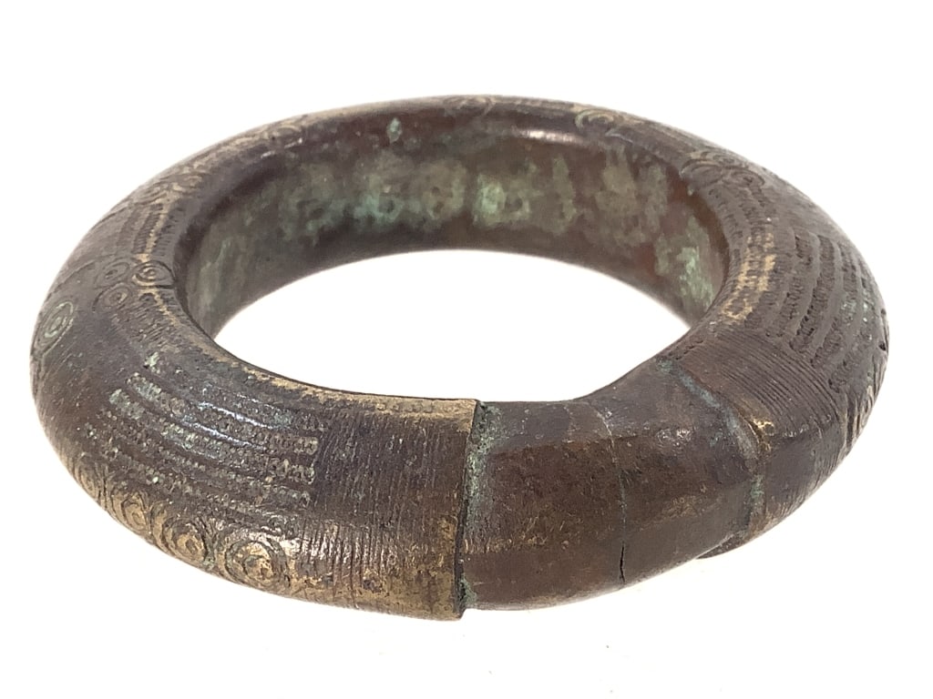 West African Currency Bracelet: 3 1/2"Dia. Provenance: Collection of William and Diane Itter. Please see photos for condition and details.