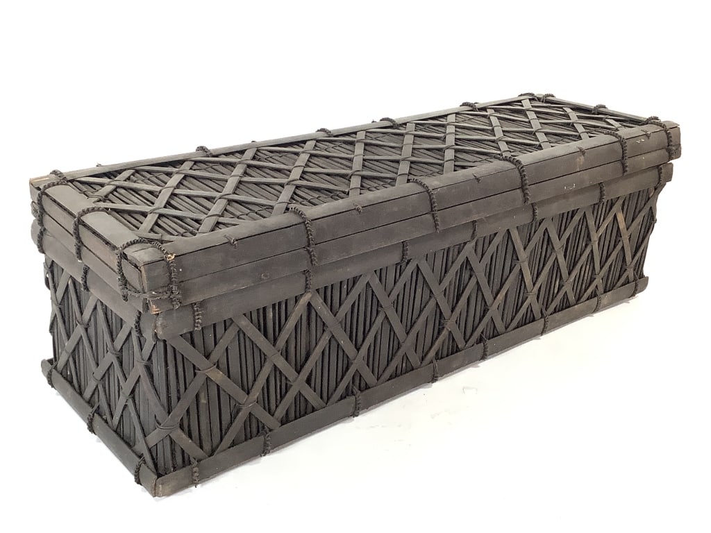 African Lidded Basket: 25 1/4"W x 8 7/8"D x 8"H. Lidded basket of wood, woven rope and natural fibers. Provenance: Collection of William and Diane Itter. Please see photos for condition and details.