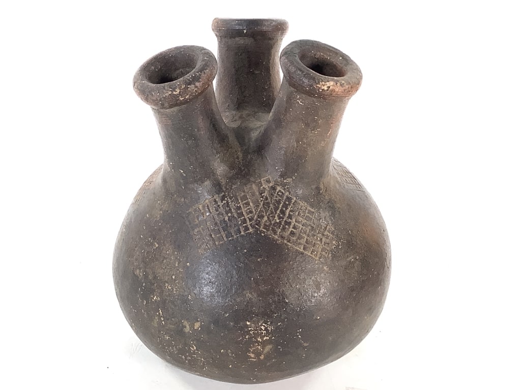 Baganda Ceramic Vessel Uganda: 8"H x 7"Dia. Hand-formed in East-Central Africa with the soft wear of genuine age. Good condition, a few minor scratches. Provenance: Collection of William and Diane Itter. Please see photos for