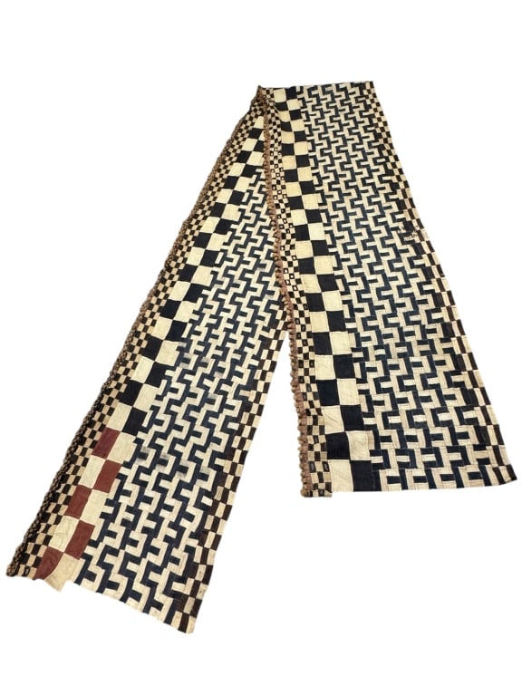 Kuba Mens Raffia Cloth Wrapper DRC: 225" x 28". Woven raffia with geometric patchwork pattern and a pom-pom fringe Highly worn with some losses. Provenance: Collection of William and Diane Itter. Please see photos for condition and