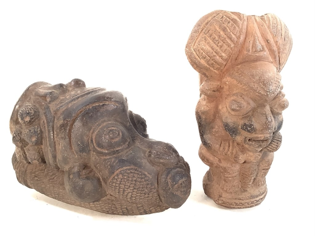 Pair of Cameroon Clay Pipe Bowls: largest 5"H. Hand-formed terracotta pipes in good condition, natural wear consistent with age. Provenance: Collection of William and Diane Itter. Please see photos for condition and details.