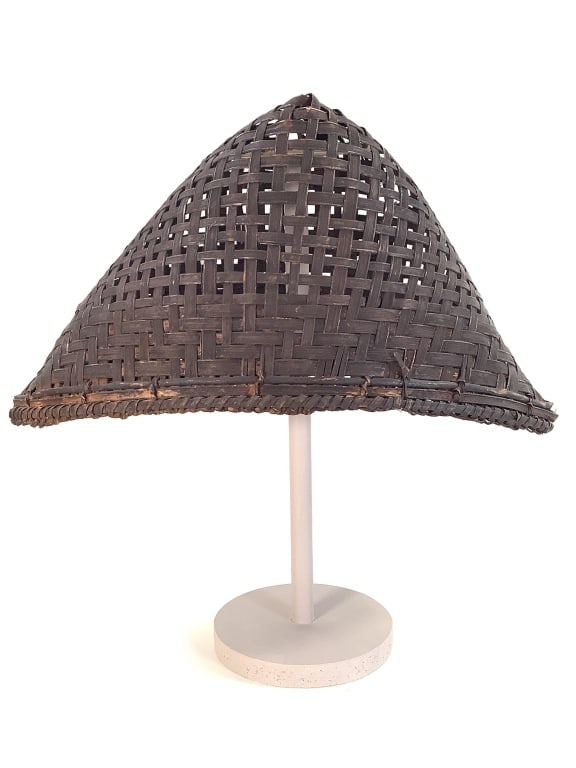 Salampasu Woven Hat Democratic Republic of Congo: 7 5/8"H x 8 1/8"W 14 1/4"D. Rattan Woven hat. Provenance: Collection of William and Diane Itter. Please see photos for condition and details.