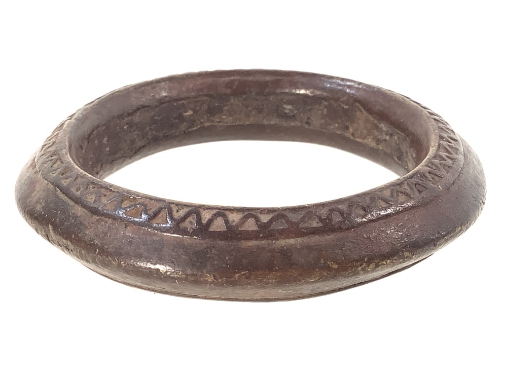 West African Bronze Currency Bracelet: 3 1/2"Dia. Bronze alloy. Provenance: Collection of William and Diane Itter. Please see photos for condition and details.