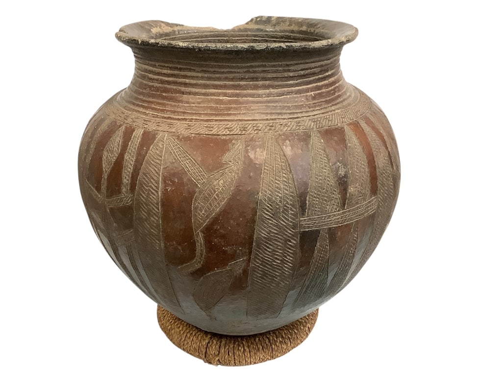 Large Bassa Komo Nigeria Jar: 17"H x15"Dia. Cracked at the top. Fair condition. Provenance: Collection of William and Diane Itter. Please see photos for condition and details. Please note: Some pots may have repairs that may not
