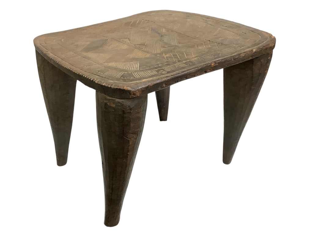 Nigerian Nupe Wooden Stool: 18"W x 15"H x 19"D. Provenance: Collection of William and Diane Itter. Please see photos for condition and details.