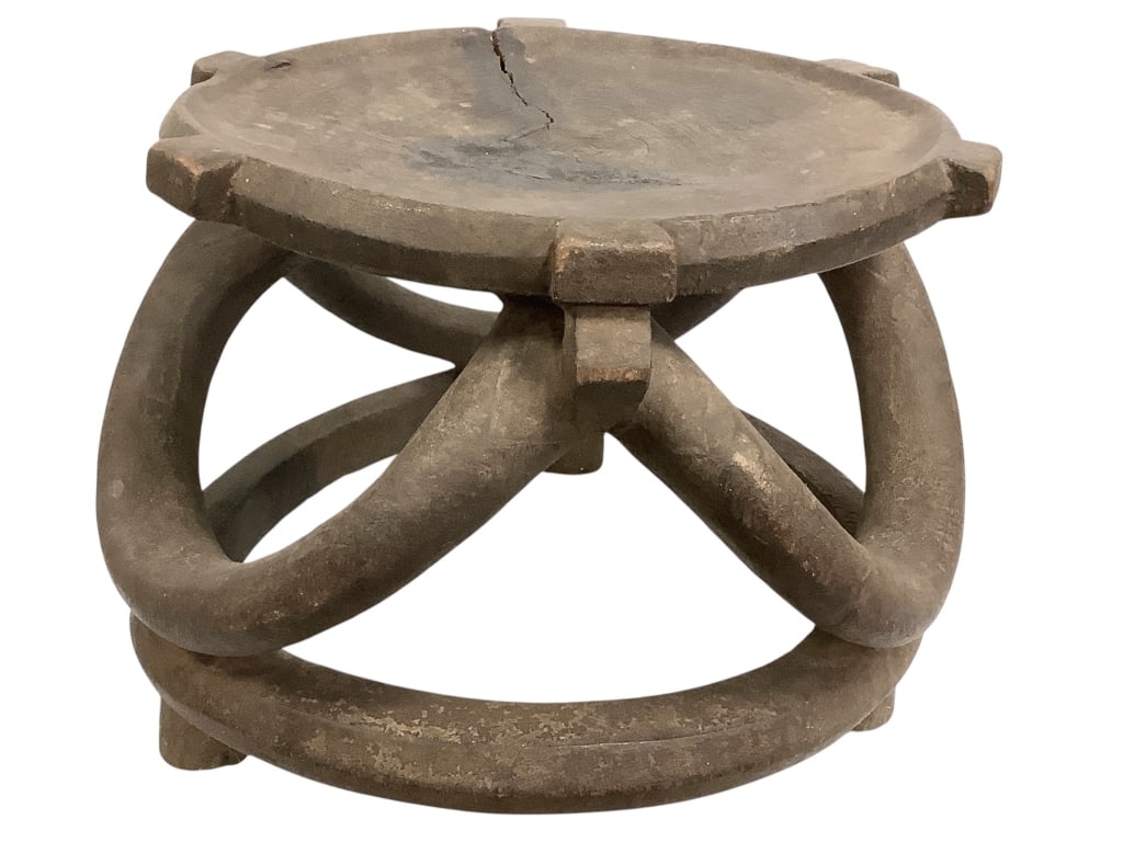 African Stool: 15"H x 19"Dia. Wood has some cracks/ fissures, otherwise good condition consistent with age. Provenance: Collection of William and Diane Itter. Please see photos for condition and details.