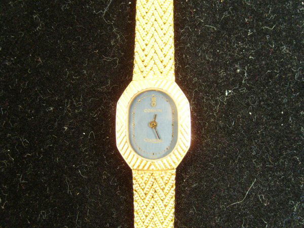 Woman's Corum Watch: Corum Watch with 18K Yellow Gold Bracelet and Case.