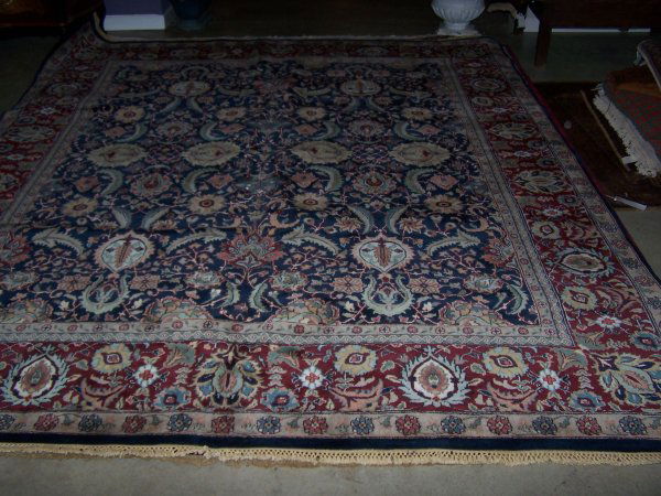 Indo Kashan: Kashan 8' x 9'9" with all over Shah Abbas design. Background is navy, with gold, green, red, peach, ivory and a floral wide border with a background color of red.