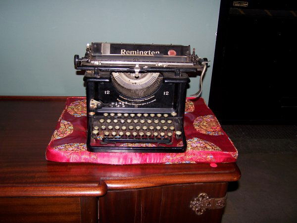 A Remington Typewriter: made in Ilian, NY USA Old fashioned typewriter from Uraguay. Approximately 16.5" W x 14" D.