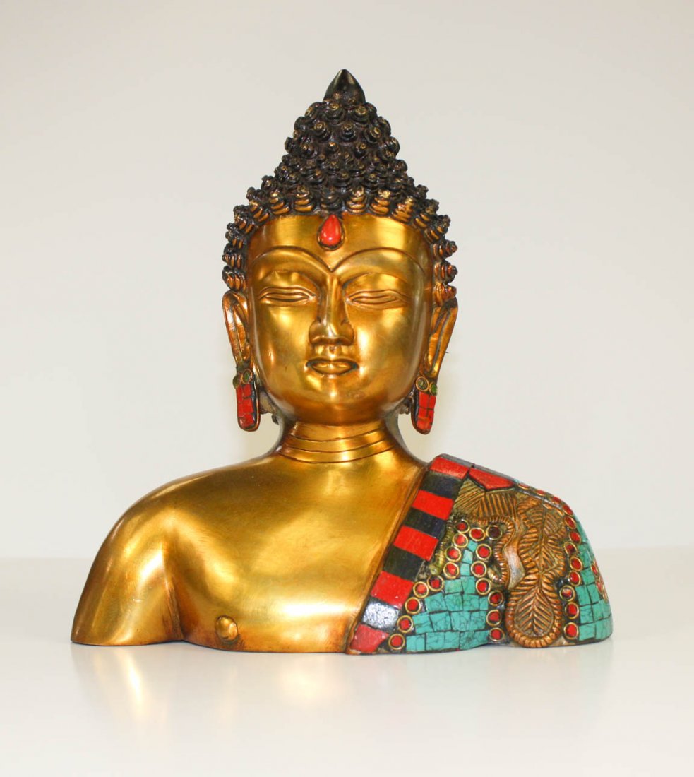 Bronze Buddha Head: Bronze Buddha head wearing traditional one-shoulder monk's robe. Bust is embedded with decorative turquoise & carnelian stones H=10 x w=9 x d=4