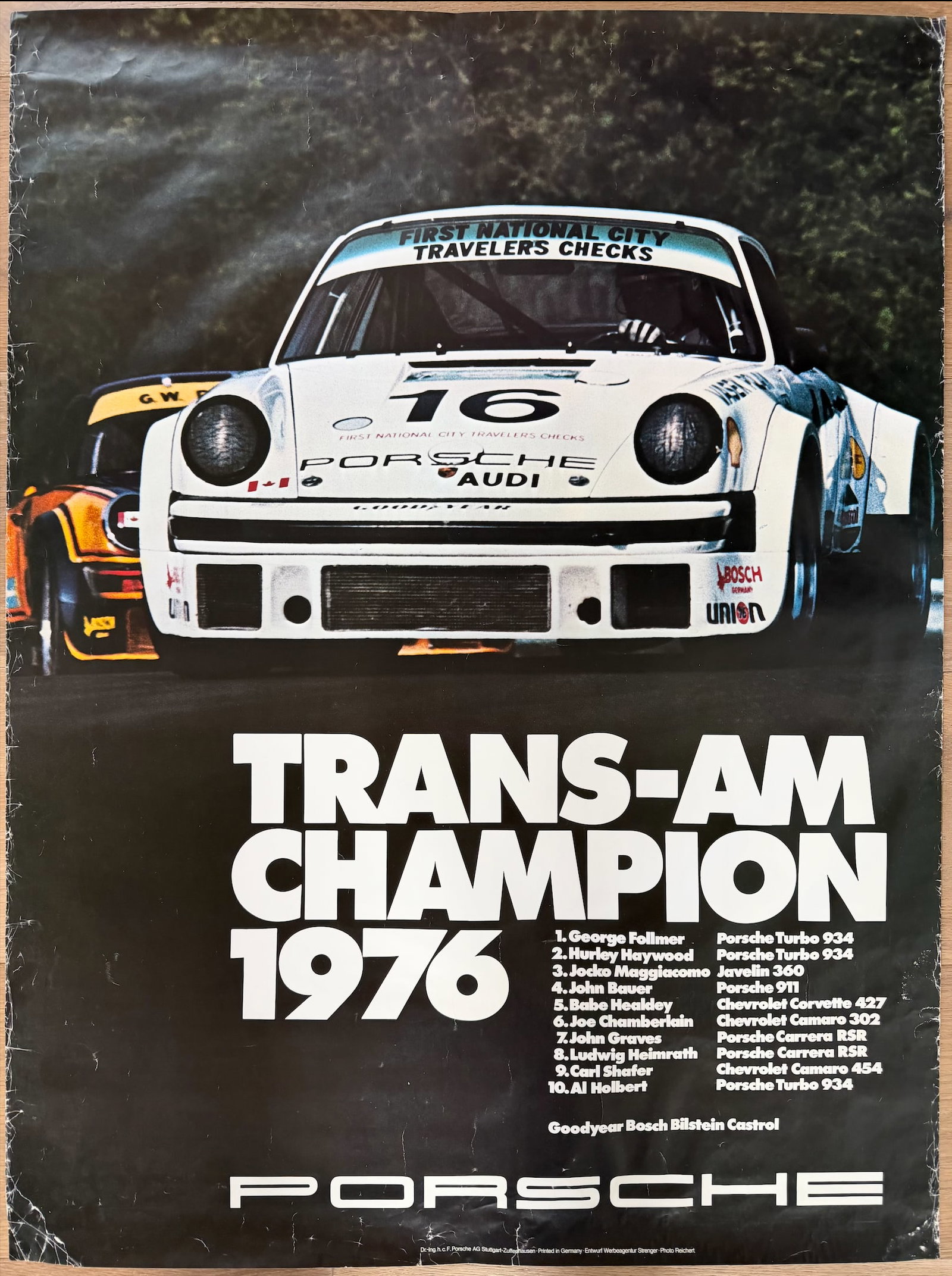 1976 Porsche factory racing poster Porsche 934 Turbo drive: This is a vintage poster celebrating the 1976 Trans-Am championship win for Porsche.