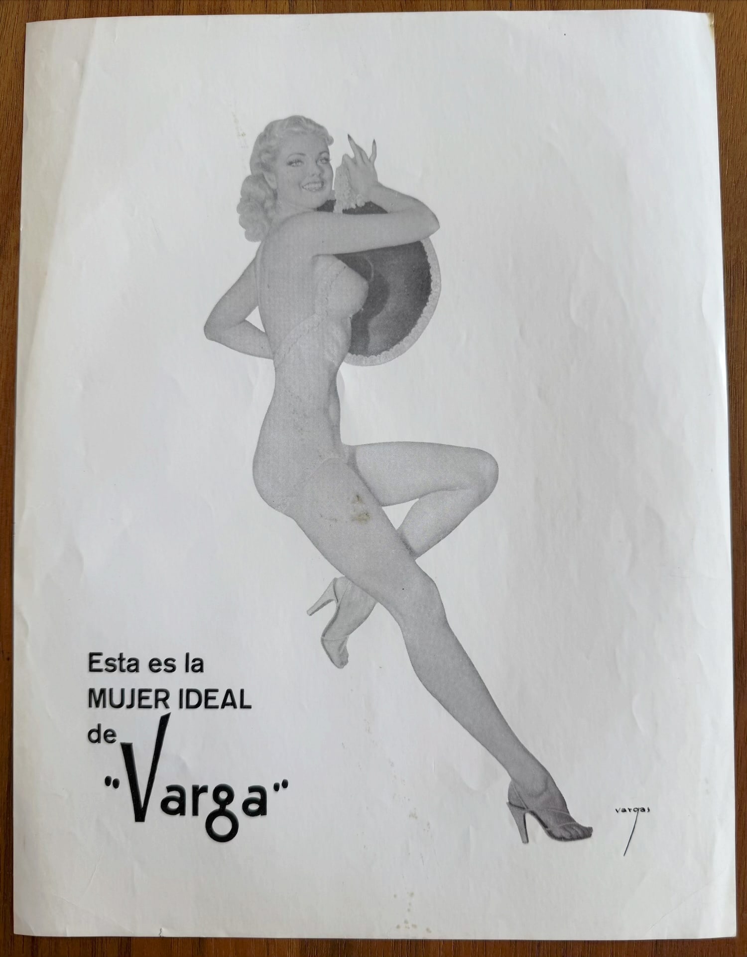 Alberto Vargas Proof "This is the IDEAL WOMAN" or "Esta es la MUJER IDEAL": a classic pin-up illustration by Alberto Vargas (often stylized as "Varga" in his signatures and branding), one of the most famous and influential pin-up artists of the 20th century.