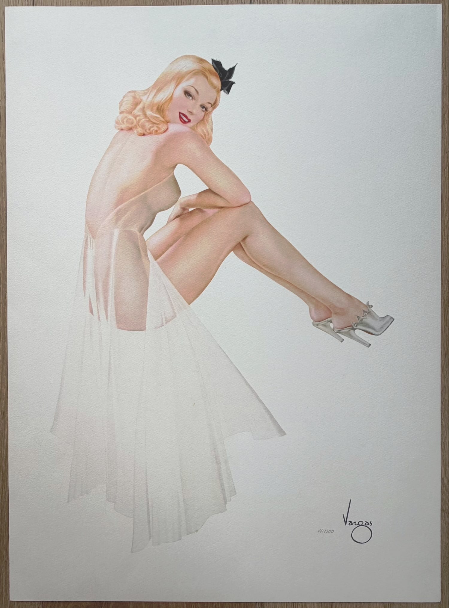 Alberto Vargas "Summer of '42" San Fransisco Art Exchange 199/200: This friendly Varga Girl must have been a welcome sight for those who turned to her image in 1942, almost one year after America entered World War II. Most likely painted in the spring or summer of 19