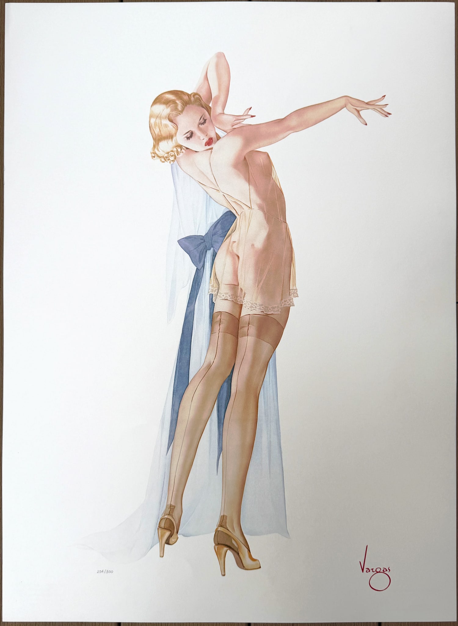 Alberto Vargas "Seams Perfect" San Francisco Art Exchange 254/300: This young lady is dressing with meticulous concern for an elegant evening. The vanity revealed as she peers over her shoulder to align the seams of her silk hosiery, highlights the importance of fash